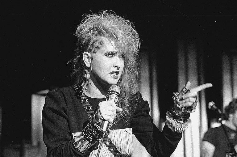 How old is Cyndi Lauper? What are her songs about? Who is she married to?